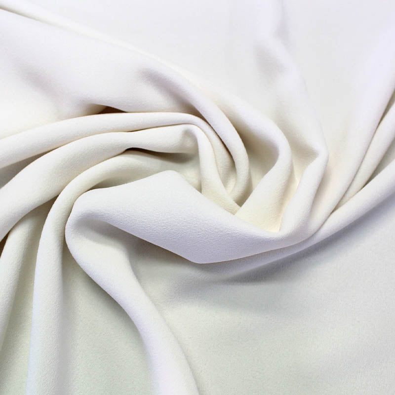 http://www.fabricsgalore.co.uk/cdn/shop/products/DressmakingPolyesterTripleCrepe-White1.jpg?v=1654760417