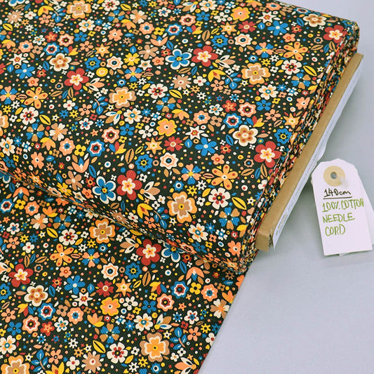 100% Cotton Black and Yellow Floral Needlecord Fabric