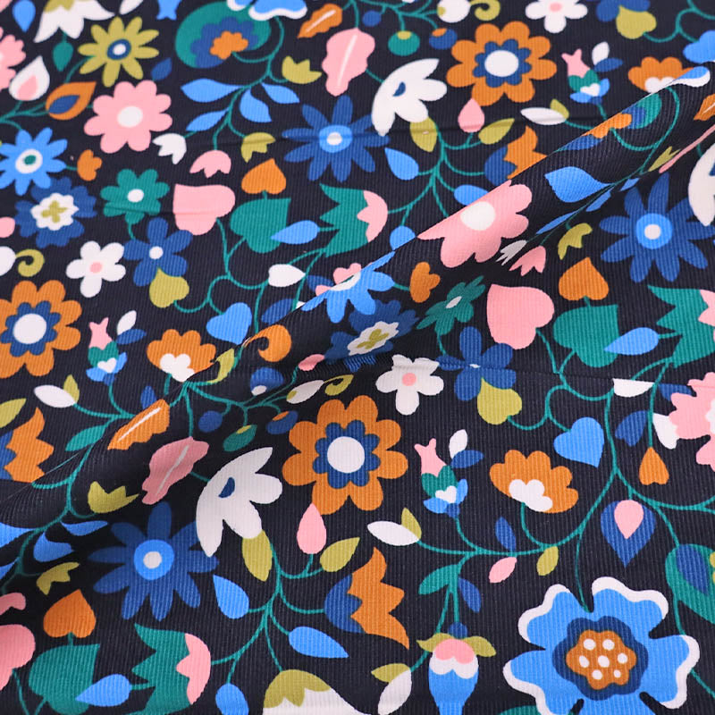 100% Cotton Black and Multicoloured
Floral Needlecord Fabric