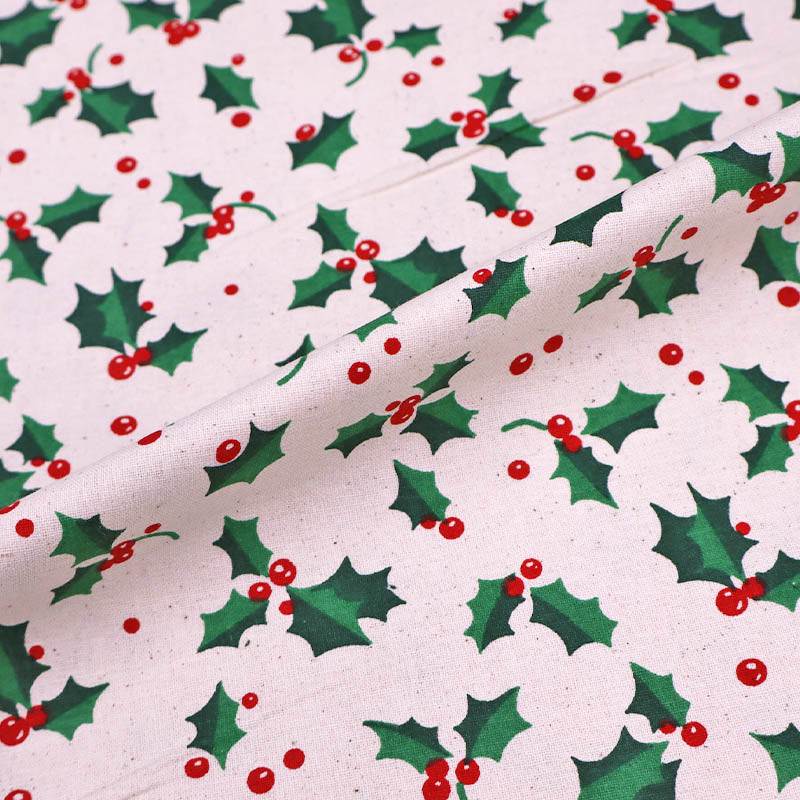 100% Cotton Cream Christmas Fabric - Holly Print