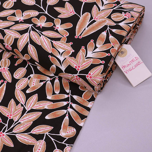 100% Viscose Black and Orange Leaf Print Viscose Fabric