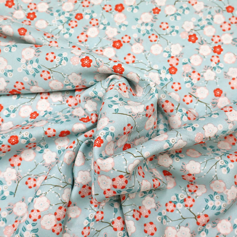 100% Viscose  Pale Blue Floral Viscose Fabric - Clementine Blossoms