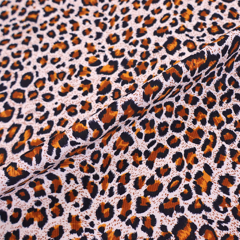 100% Cotton Leopard Print Needlecord Fabric - Orange